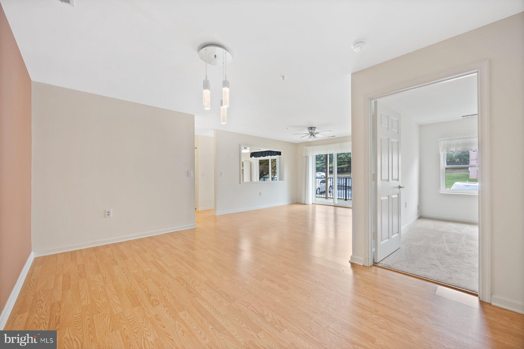 3901 Darleigh Road, Unit 1E Nottingham, MD 21236 - Photo 11 of 27 wooden floor in an empty room