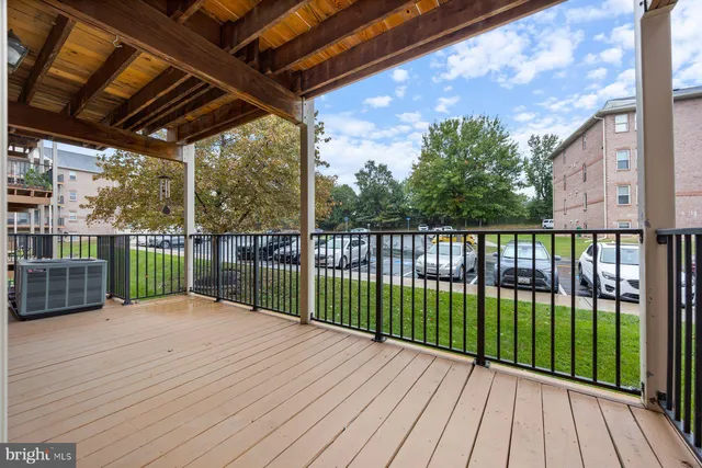 a view of backyard with a swimming pool