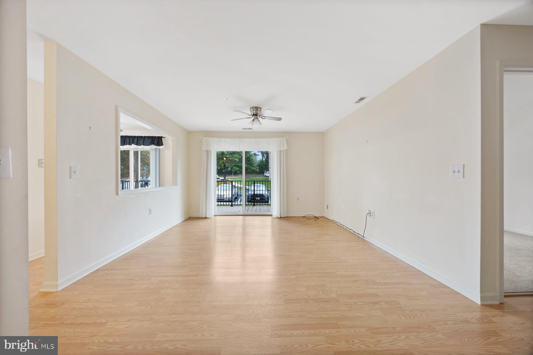 3901 Darleigh Road, Unit 1E Nottingham, MD 21236 - Photo 4 of 27 a view of an empty room with a window