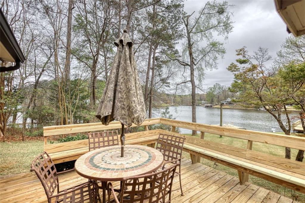 1665 County Line Road Mansfield, GA 30055 - Photo 40 of 74 a outdoor space with a table and chairs