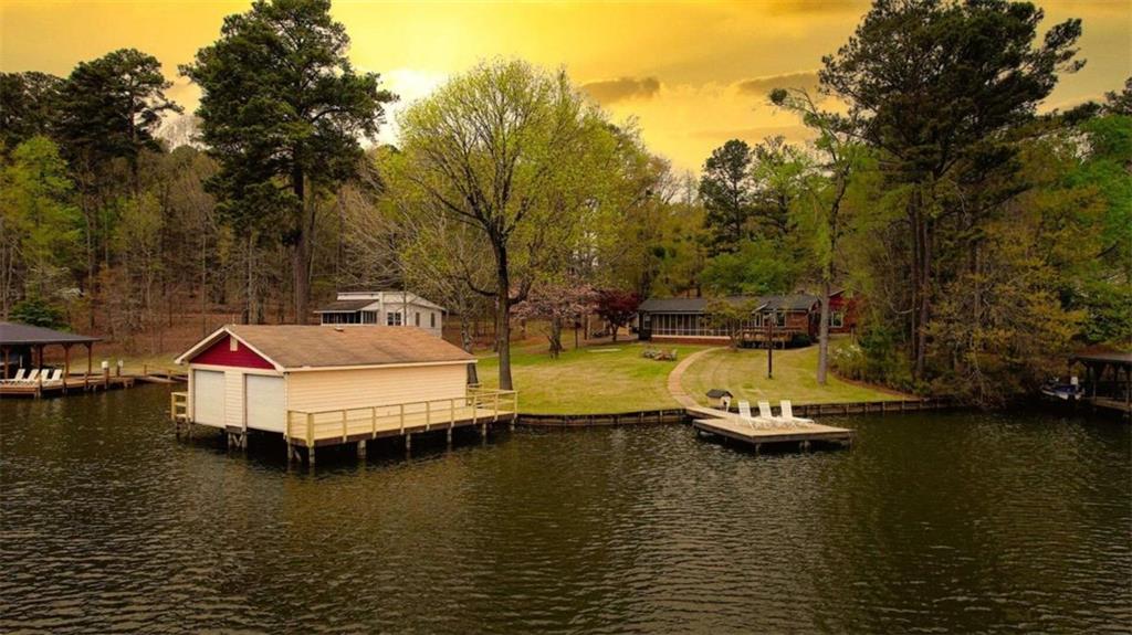 1665 County Line Road Mansfield, GA 30055 - Photo 4 of 74 a view of a lake with boats and trees