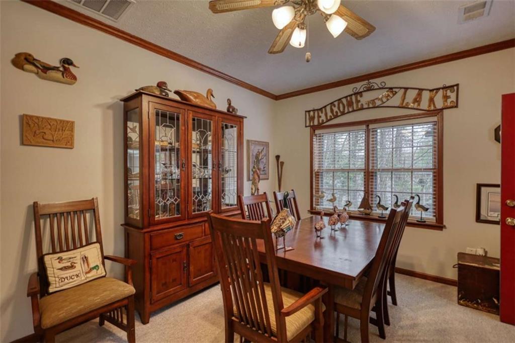 1665 County Line Road Mansfield, GA 30055 - Photo 45 of 74 a view of a dining room with furniture window and outside view