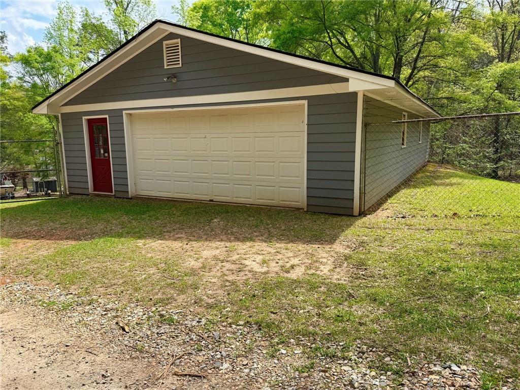 1665 County Line Road Mansfield, GA 30055 - Photo 63 of 74 a front view of house with yard