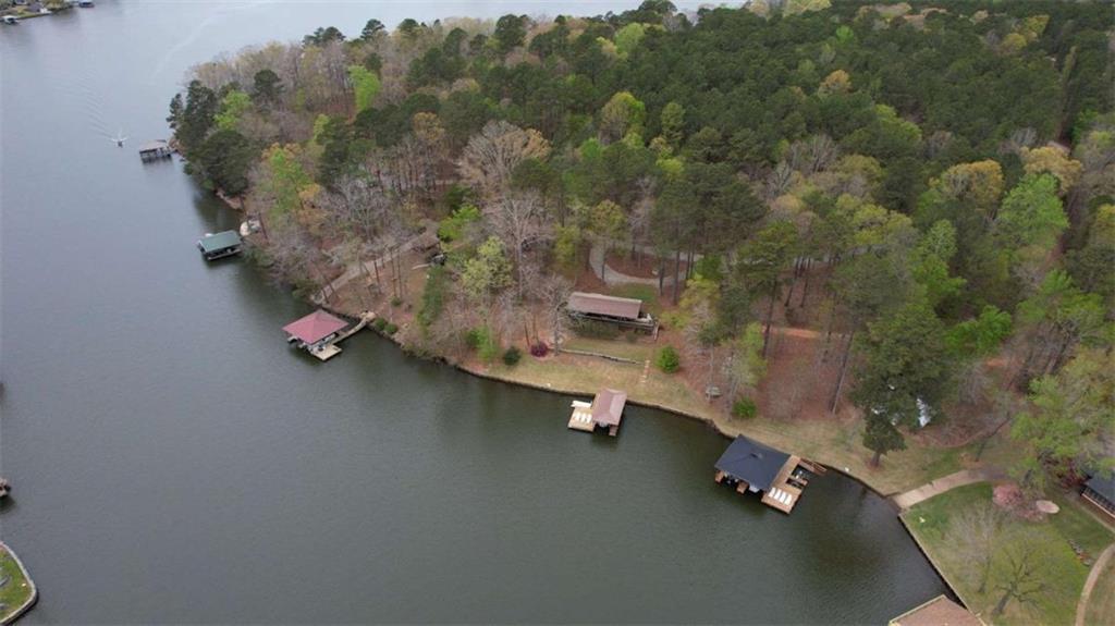 1665 County Line Road Mansfield, GA 30055 - Photo 69 of 74 an aerial view of a house with a yard swimming pool and outdoor seating