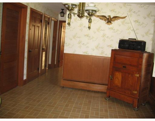 51 Greylock Road Bristol, RI 02809 - Photo 5 of 9 Interior Space/Layout. The spacious kitchen and dining room opens to the fireplaced living room and continues around and enters all bedrooms.