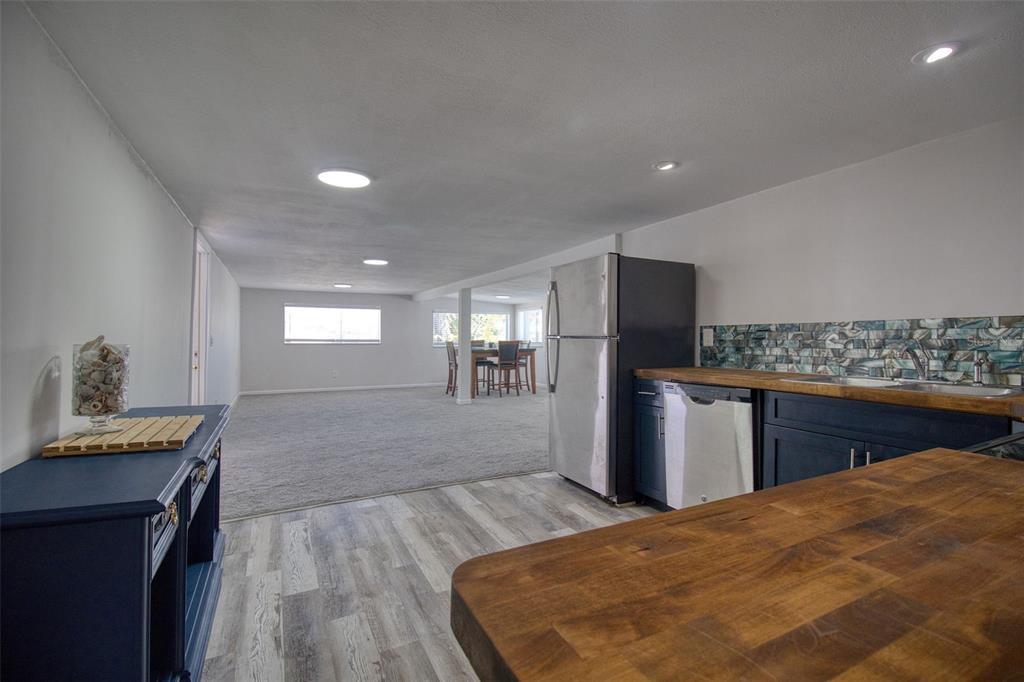 6820 Sea Ranch Drive Hudson, FL 34667 - Photo 8 of 29 a spacious bathroom with a granite countertop sink and a mirror