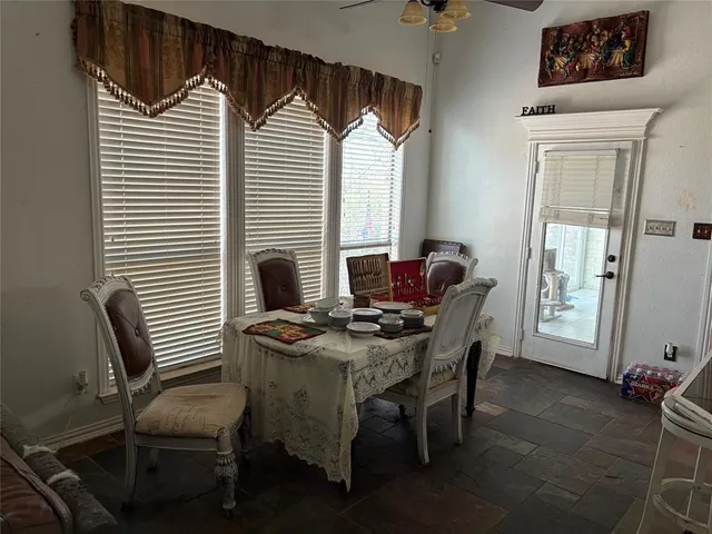 a workspace with furniture and window