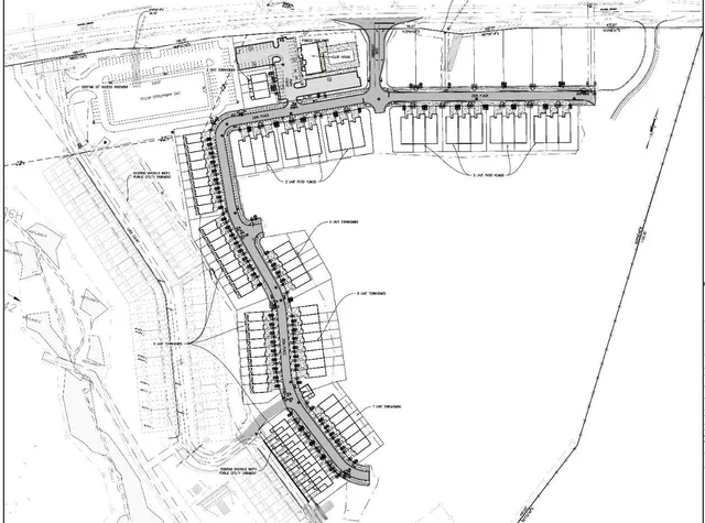 a picture of a bathroom with a white wall