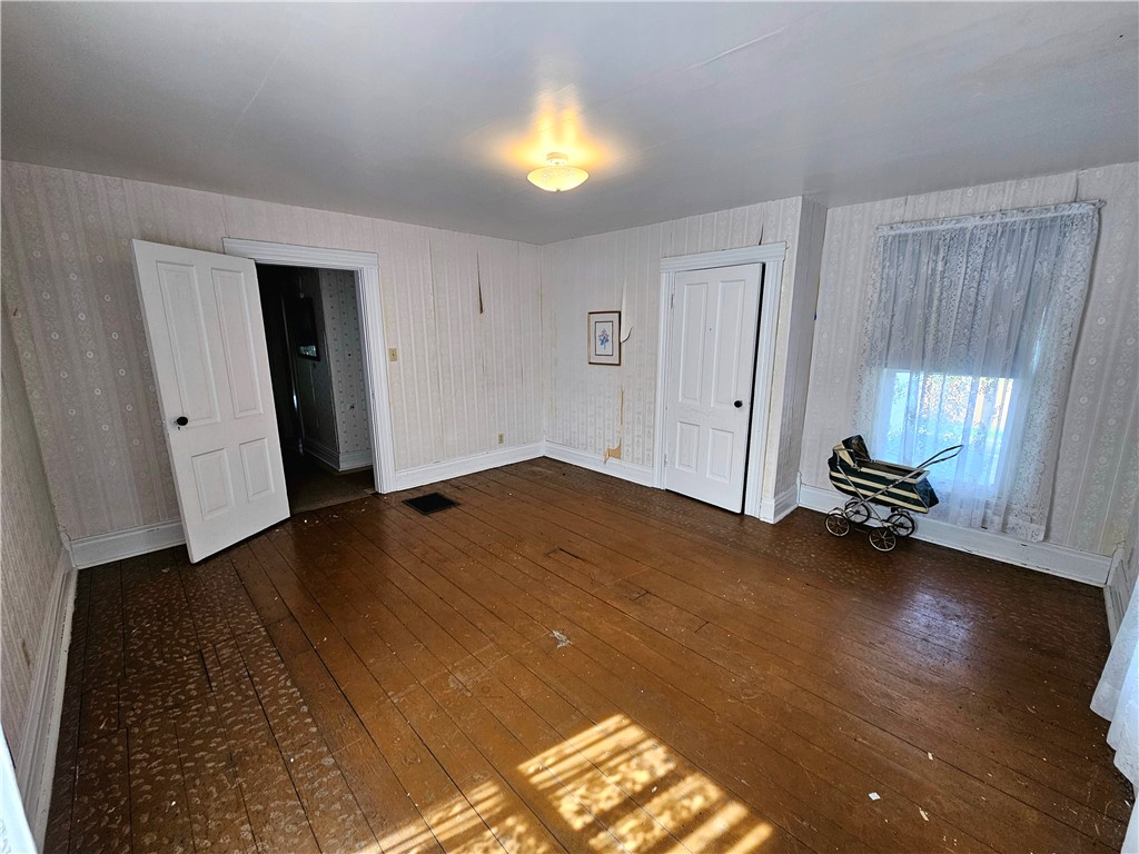 16838 350 North Road Ridge Farm, IL 61870 - Photo 16 of 17 a view of empty room with wooden floor and window