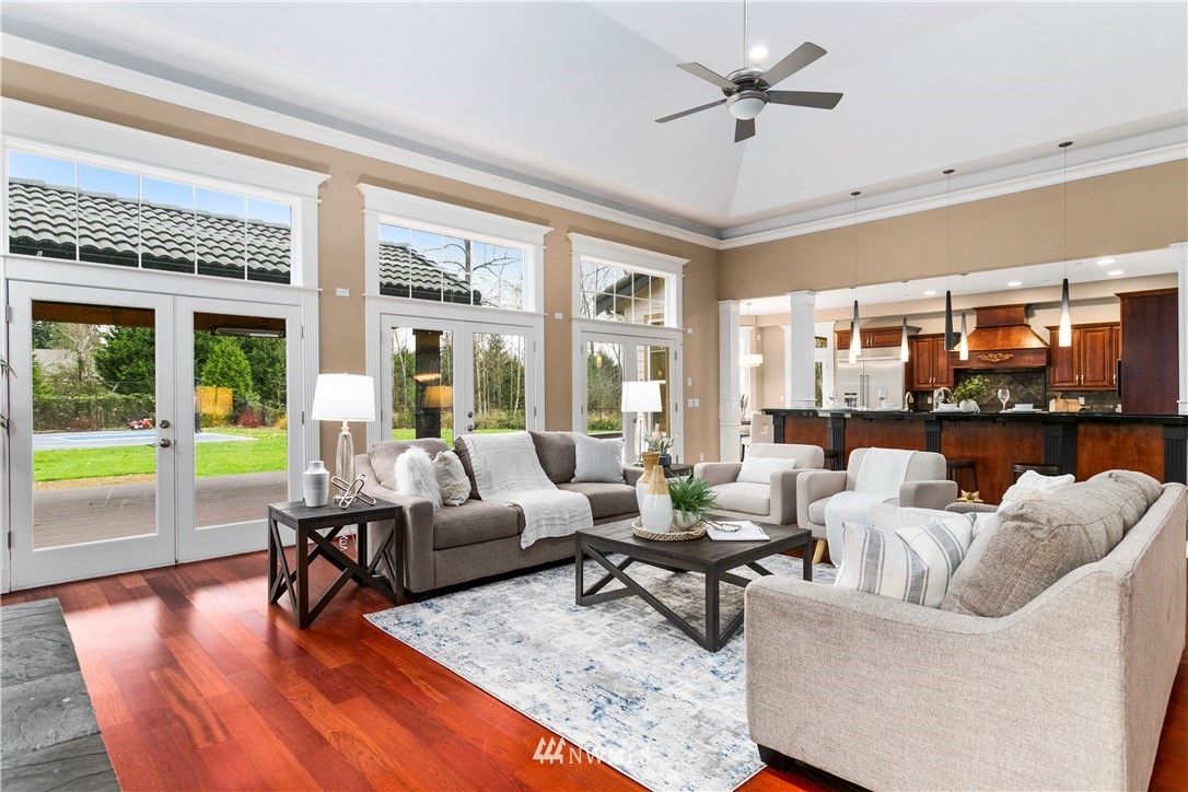 20630 Southeast 216th Street Maple Valley, WA 98038 - Photo 19 of 40 a living room with furniture and a large window