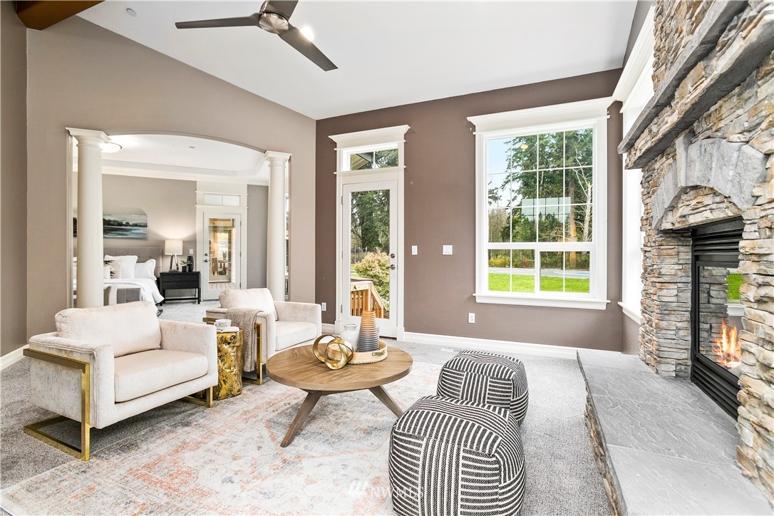 20630 Southeast 216th Street Maple Valley, WA 98038 - Photo 23 of 40 a living room with furniture and a window
