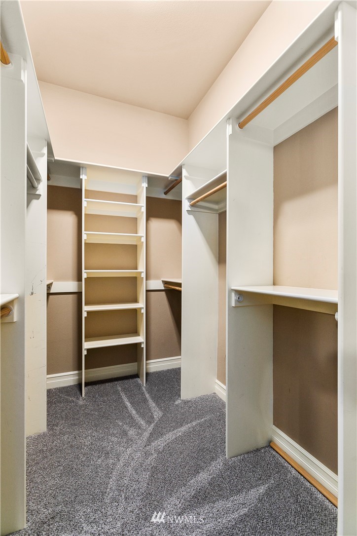 20630 Southeast 216th Street Maple Valley, WA 98038 - Photo 29 of 40 a view of walk in closet with empty racks