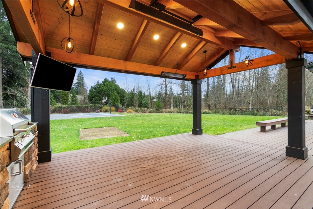 20630 Southeast 216th Street Maple Valley, WA 98038 - Photo 38 of 40 a view of a patio with a yard