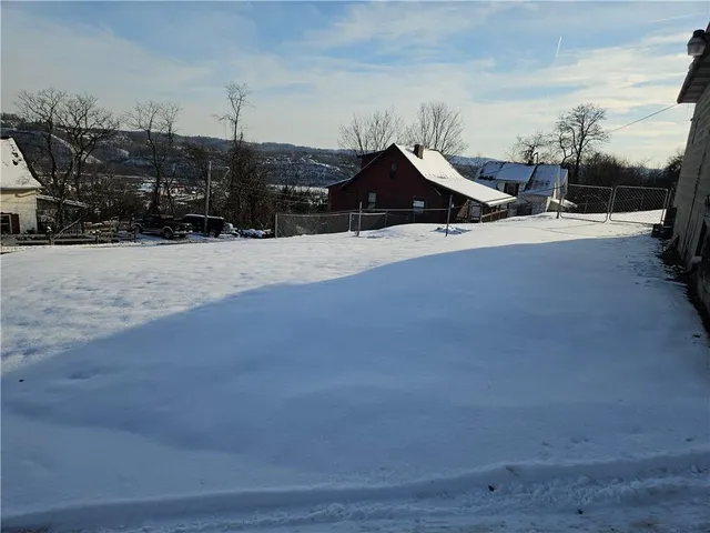 a view of outdoor space and yard