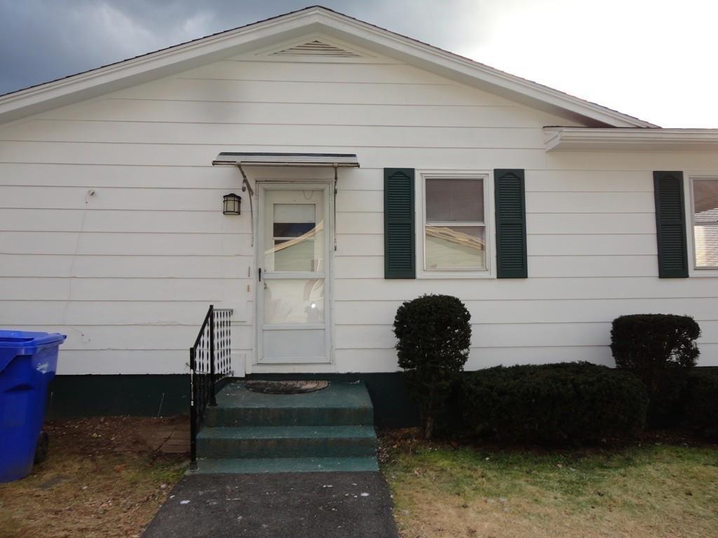 103 Garnet Street Springfield, MA 01129 - Photo 2 of 16 a front view of a house