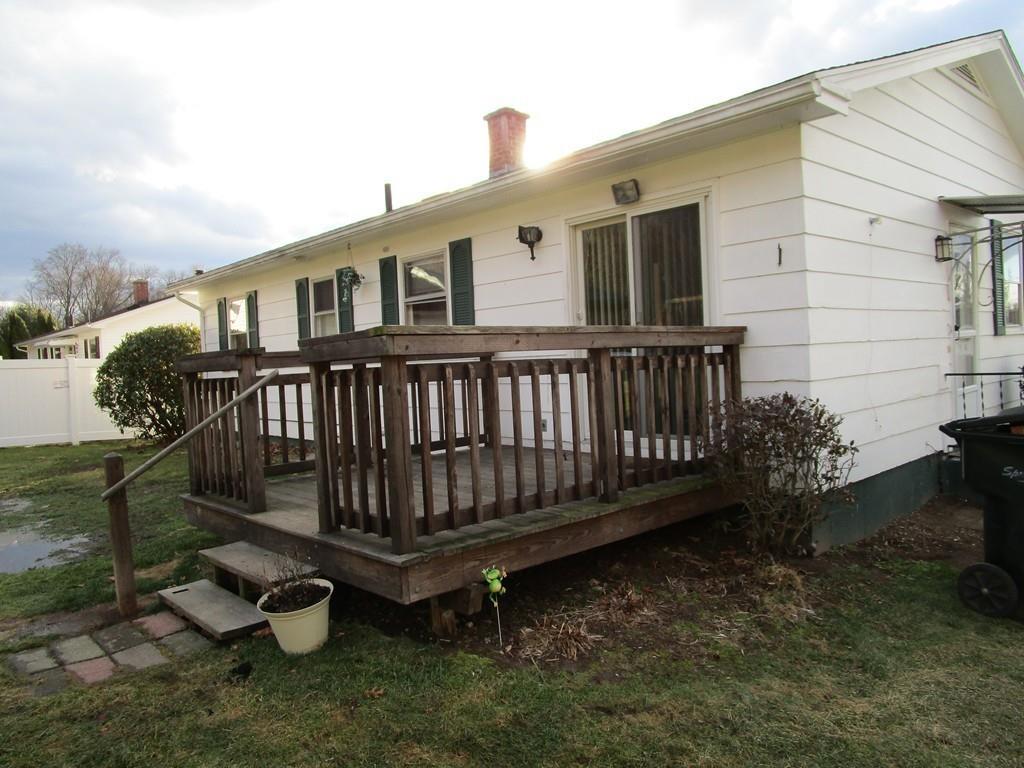 103 Garnet Street Springfield, MA 01129 - Photo 4 of 16 a view of a house with backyard and sitting area