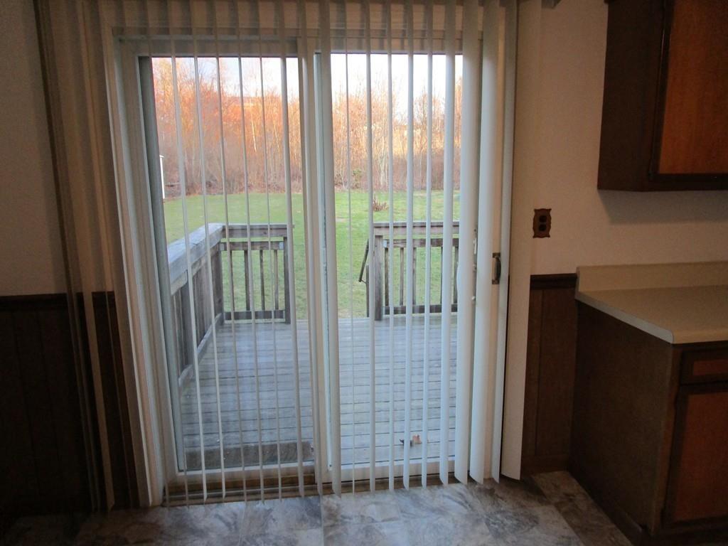 103 Garnet Street Springfield, MA 01129 - Photo 6 of 16 a view of entryway with wooden floor and door