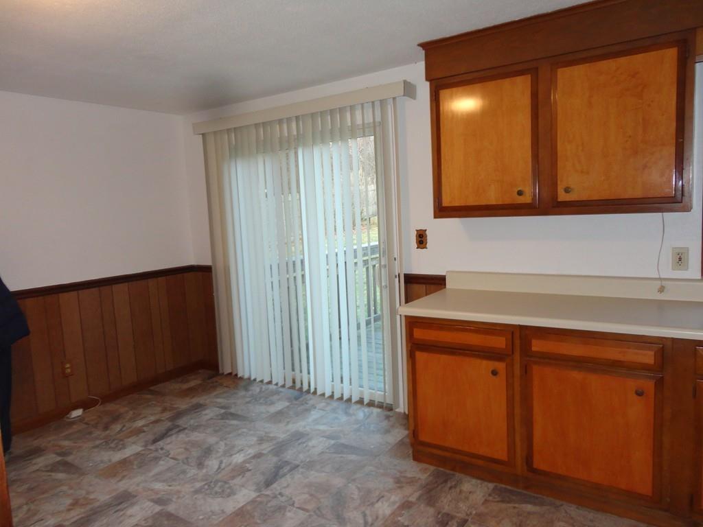 103 Garnet Street Springfield, MA 01129 - Photo 7 of 16 a view of a storage and utility room with a sink