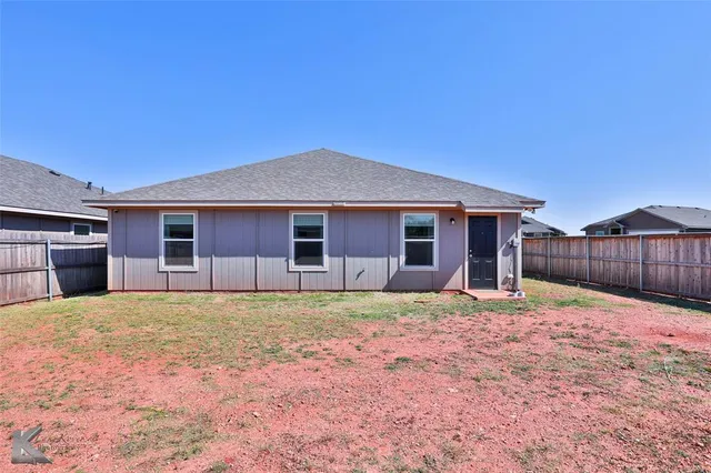 a outdoor space with wooden fence
