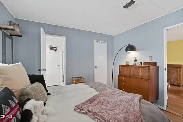 a en suite bathroom with a sink and a window