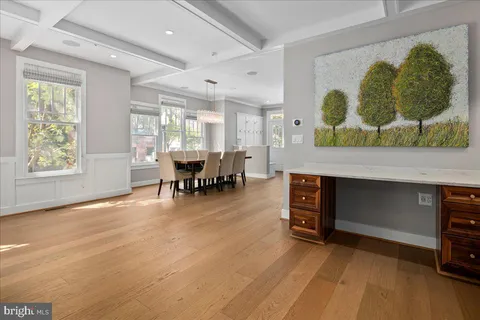 a view of a room with furniture and window