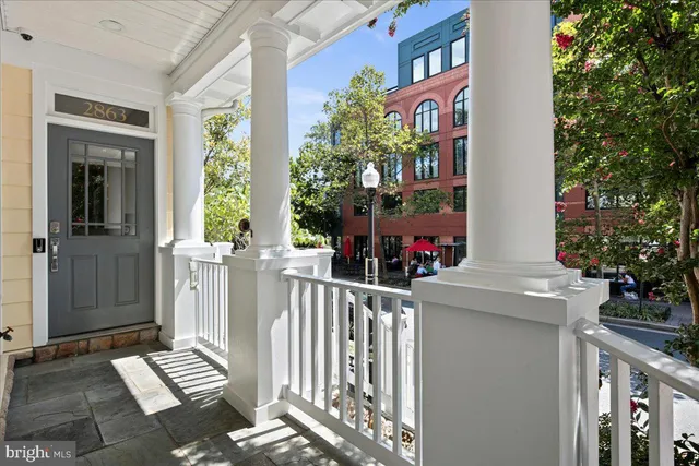 a view of an entryway with outdoor seating