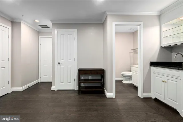 a view of room with flat screen tv and a window