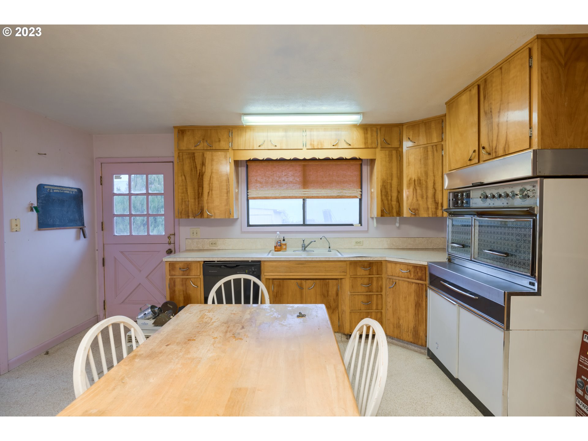 7120 Perrydale Road Amity, OR 97101 - Photo 11 of 16 a kitchen with a stove a sink and a microwave