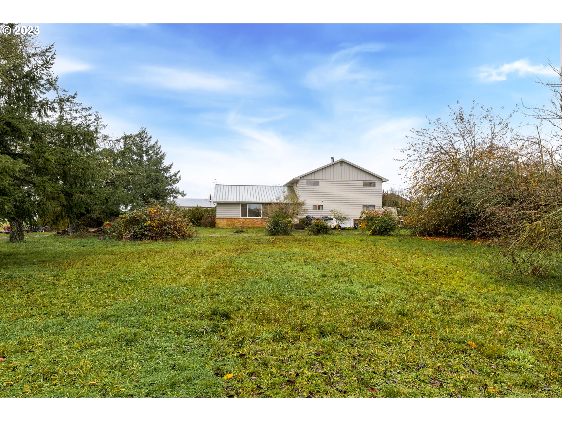 7120 Perrydale Road Amity, OR 97101 - Photo 5 of 16 a house view with a garden space