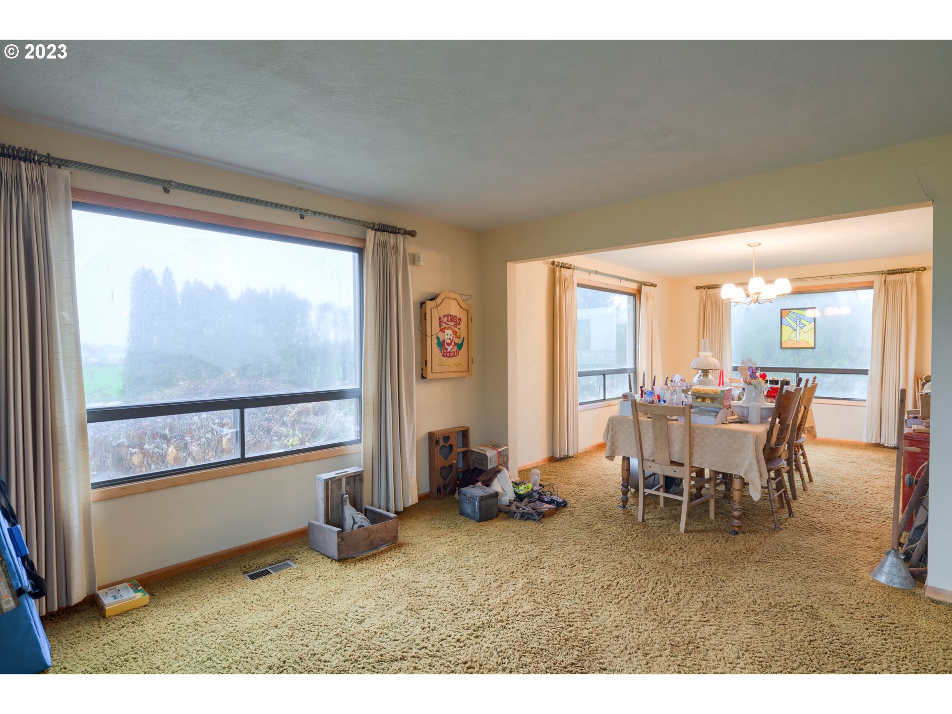 7120 Perrydale Road Amity, OR 97101 - Photo 7 of 16 a dining room with furniture and a large window