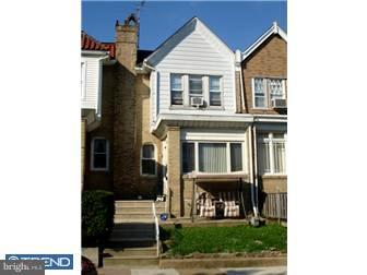 240 Wembly Road Upper Darby, PA 19082 - Photo 1 of 12 a front view of a house with a yard