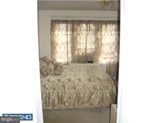 240 Wembly Road Upper Darby, PA 19082 - Photo 7 of 12 a view of a room with a large window