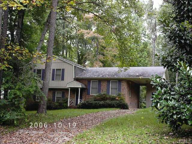4308 Pike Road Raleigh, NC 27613 - Photo 1 of 1 a front view of a house with garden