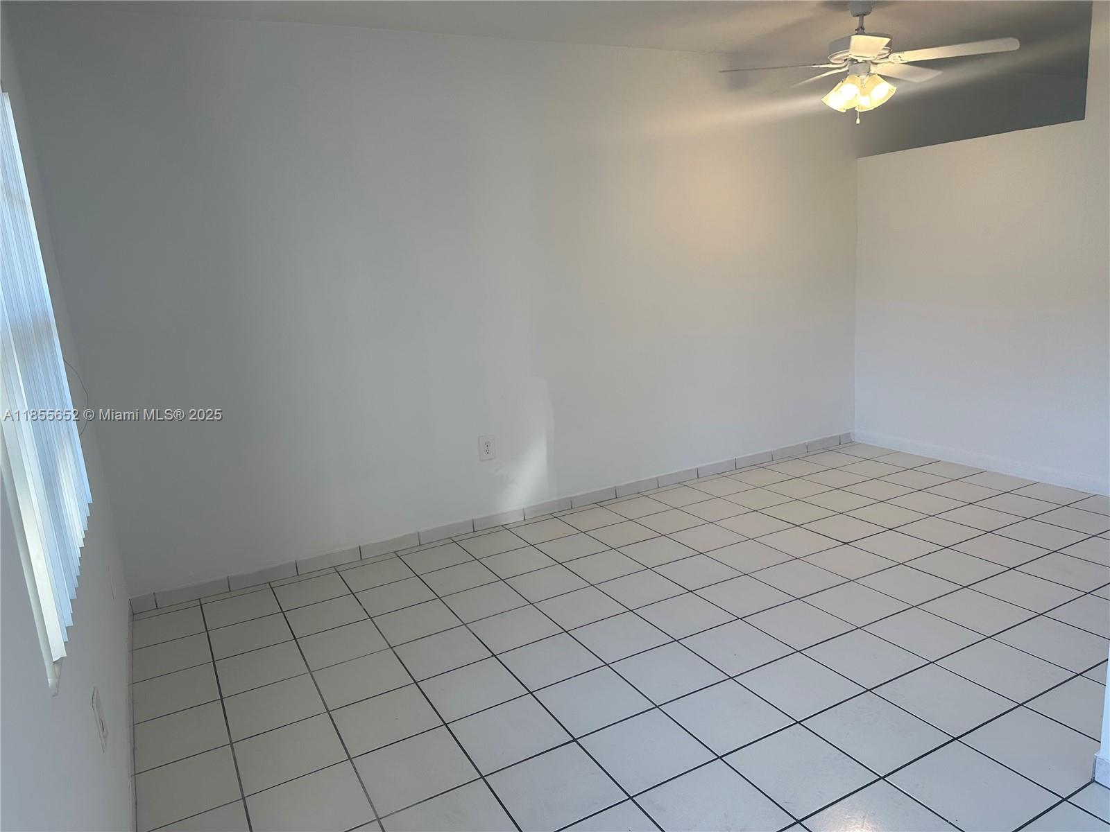 8350 Southwest 65th Avenue, Unit N4 Miami, FL 33143 - Photo 5 of 12 a view of an empty room