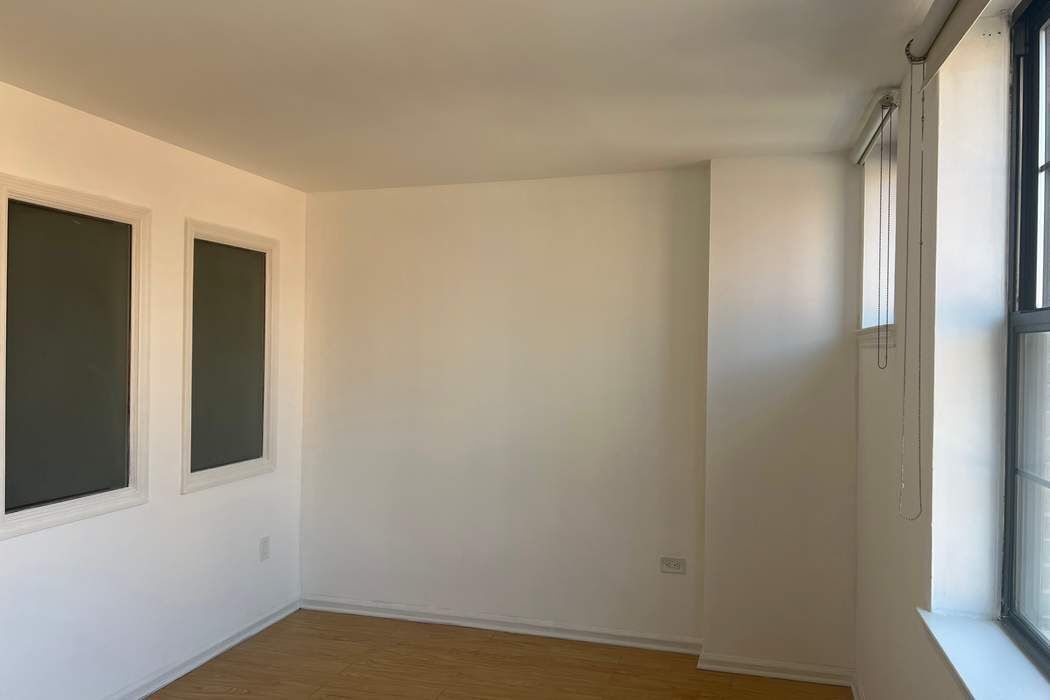 222 West 14th Street, Unit 6H Manhattan, NY 10011 - Photo 10 of 14 a view of an empty room