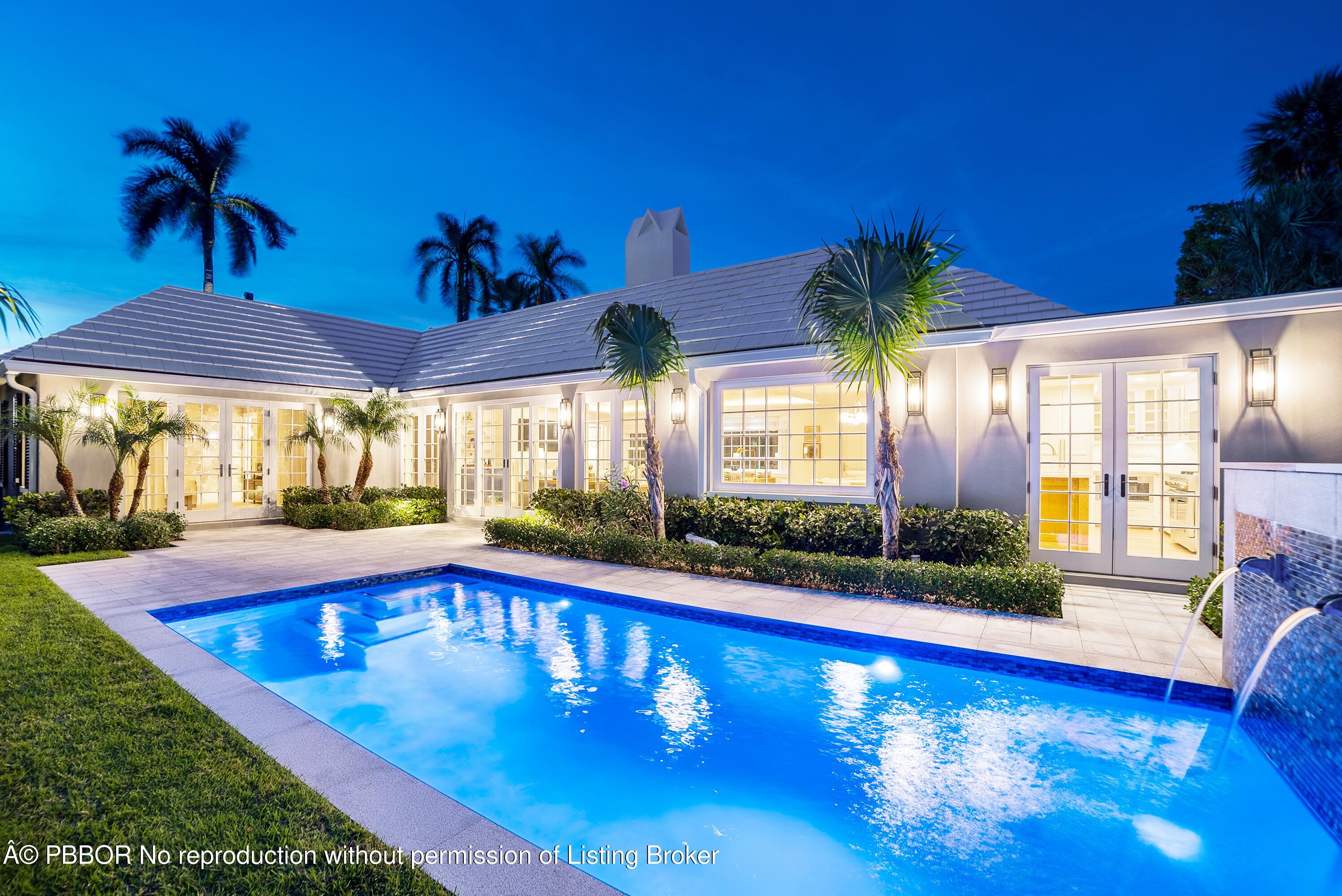 284 Monterey Road Palm Beach, FL 33480 - Photo 2 of 21 a view of swimming pool with patio