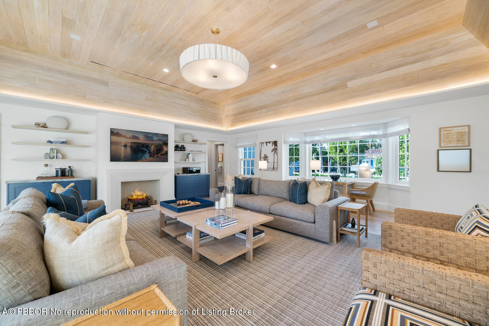 284 Monterey Road Palm Beach, FL 33480 - Photo 3 of 21 a living room with furniture kitchen and a chandelier