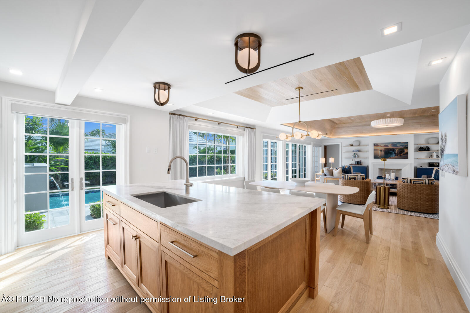 284 Monterey Road Palm Beach, FL 33480 - Photo 6 of 21 a large white kitchen with a large window