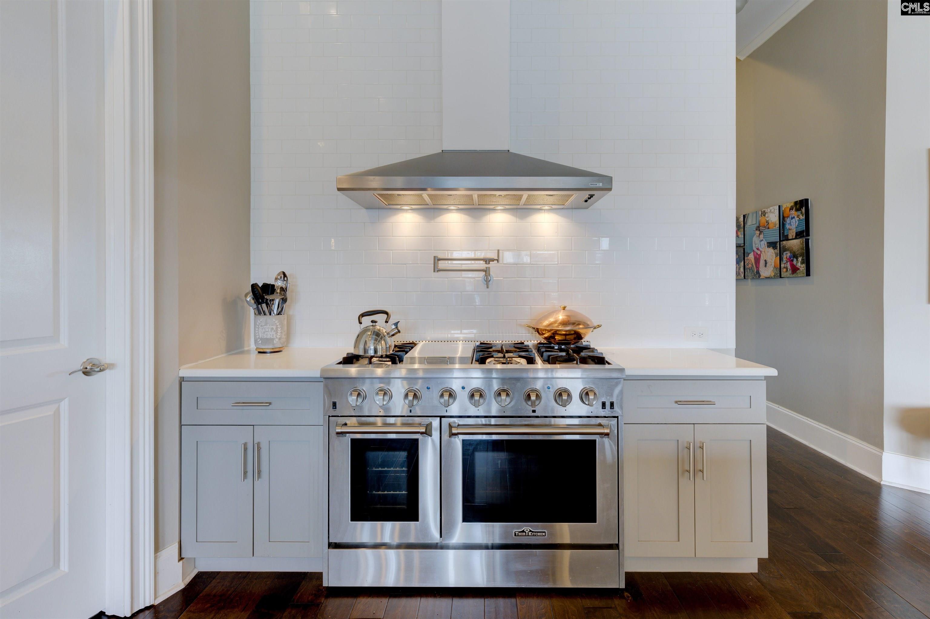 305 Northlake Road Columbia, SC 29223 - Photo 21 of 46 a stove top oven sitting inside of a kitchen