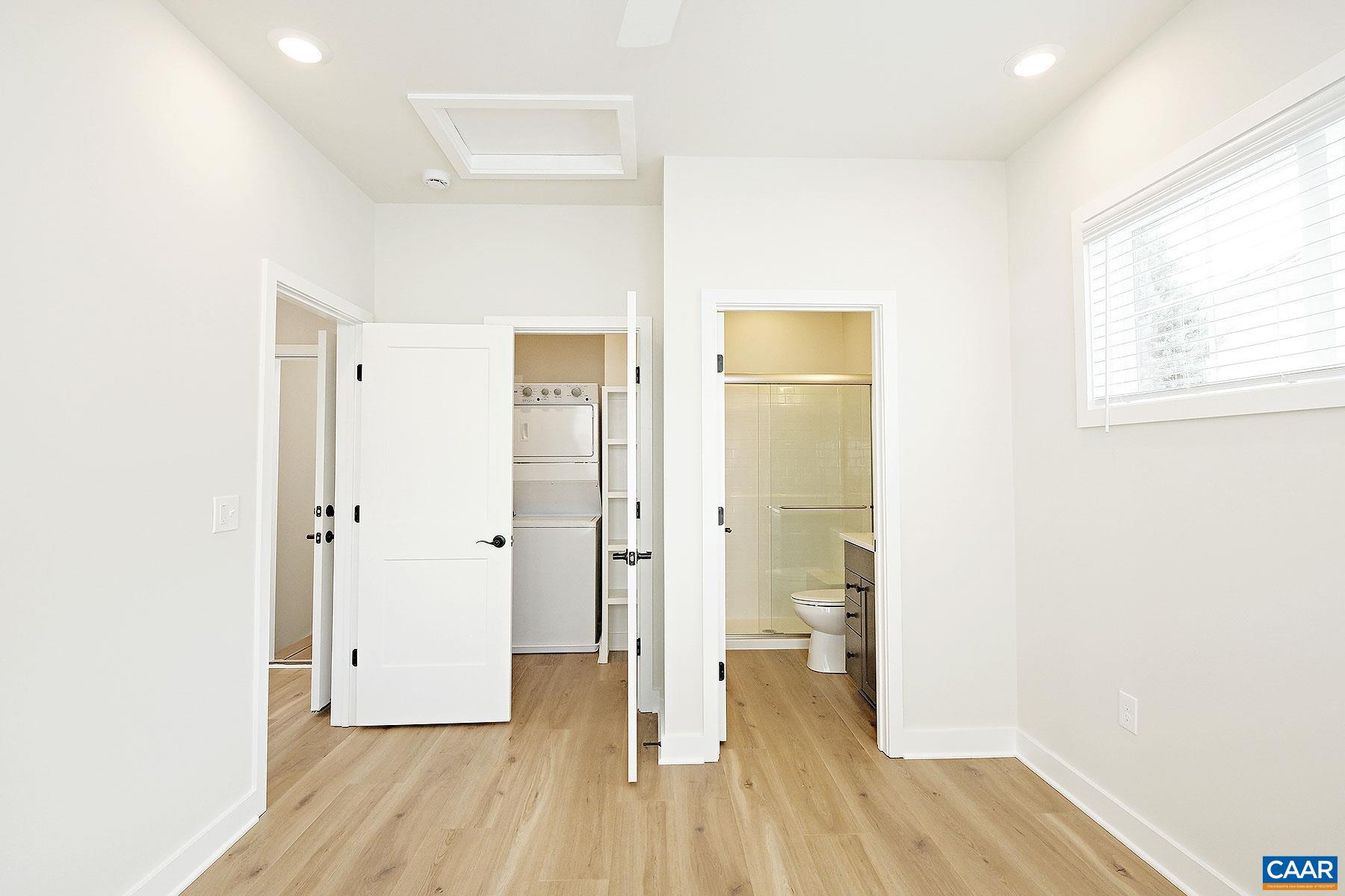 917 Belmont Avenue, Unit A Charlottesville, VA 22902 - Photo 7 of 11 a view of wooden floor in an empty room