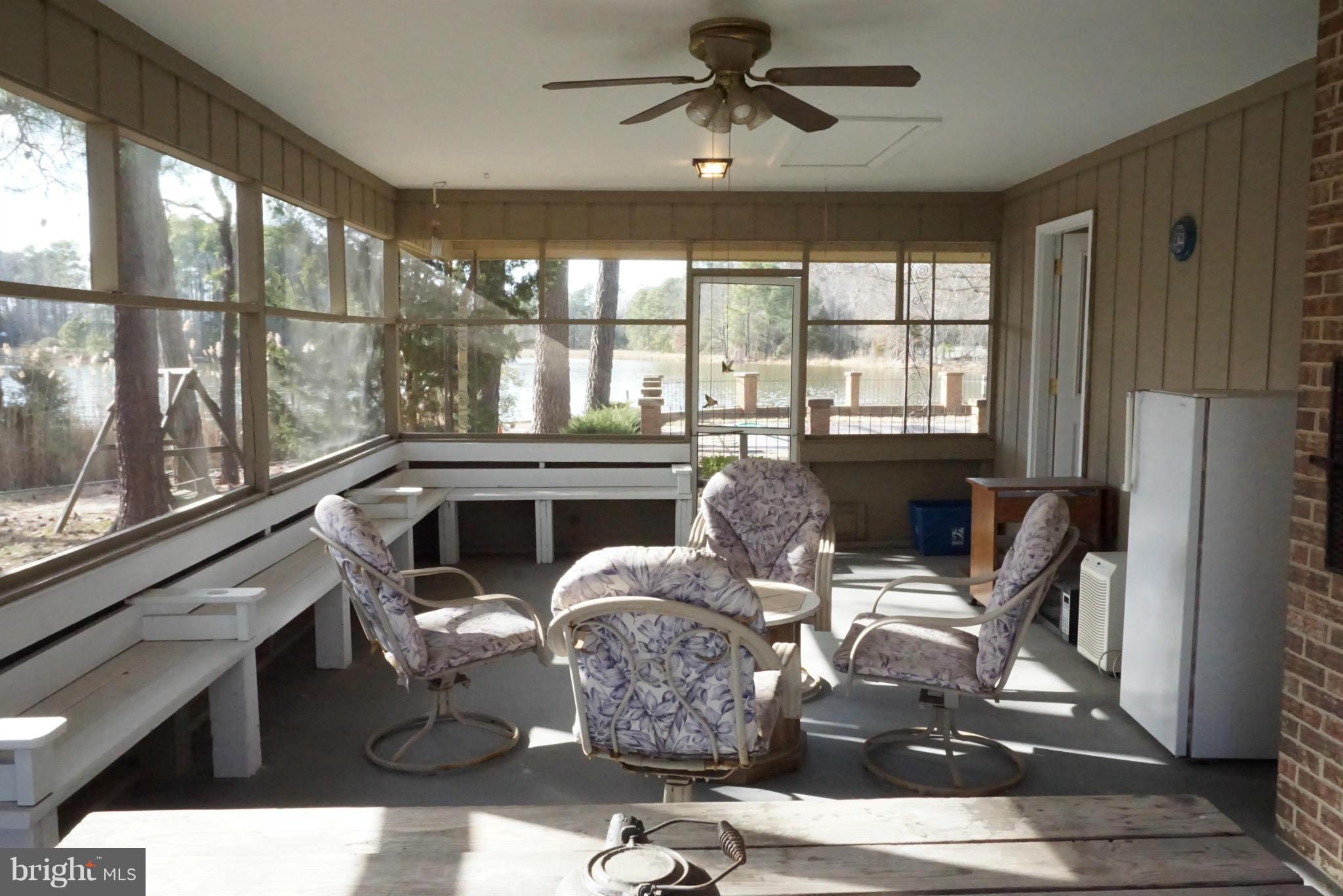 11670 Perry Branch Road Newburg, MD 20664 - Photo 24 of 30 a living room with furniture and large windows