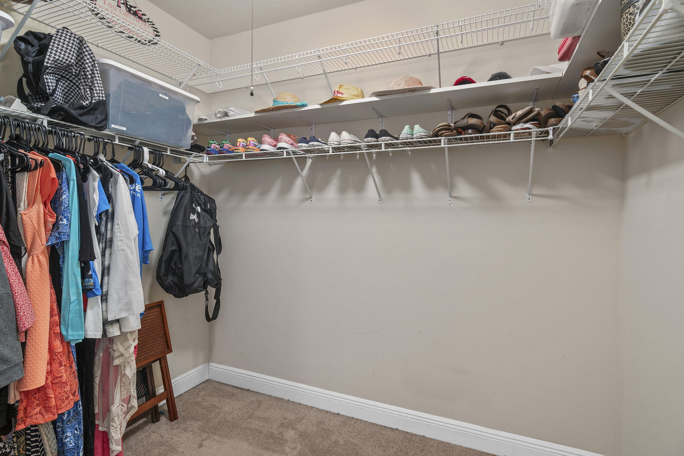 159 Lullaby Loop Santa Rosa Beach, FL 32459 - Photo 16 of 42 a view of walk in closet with clothes and shoes
