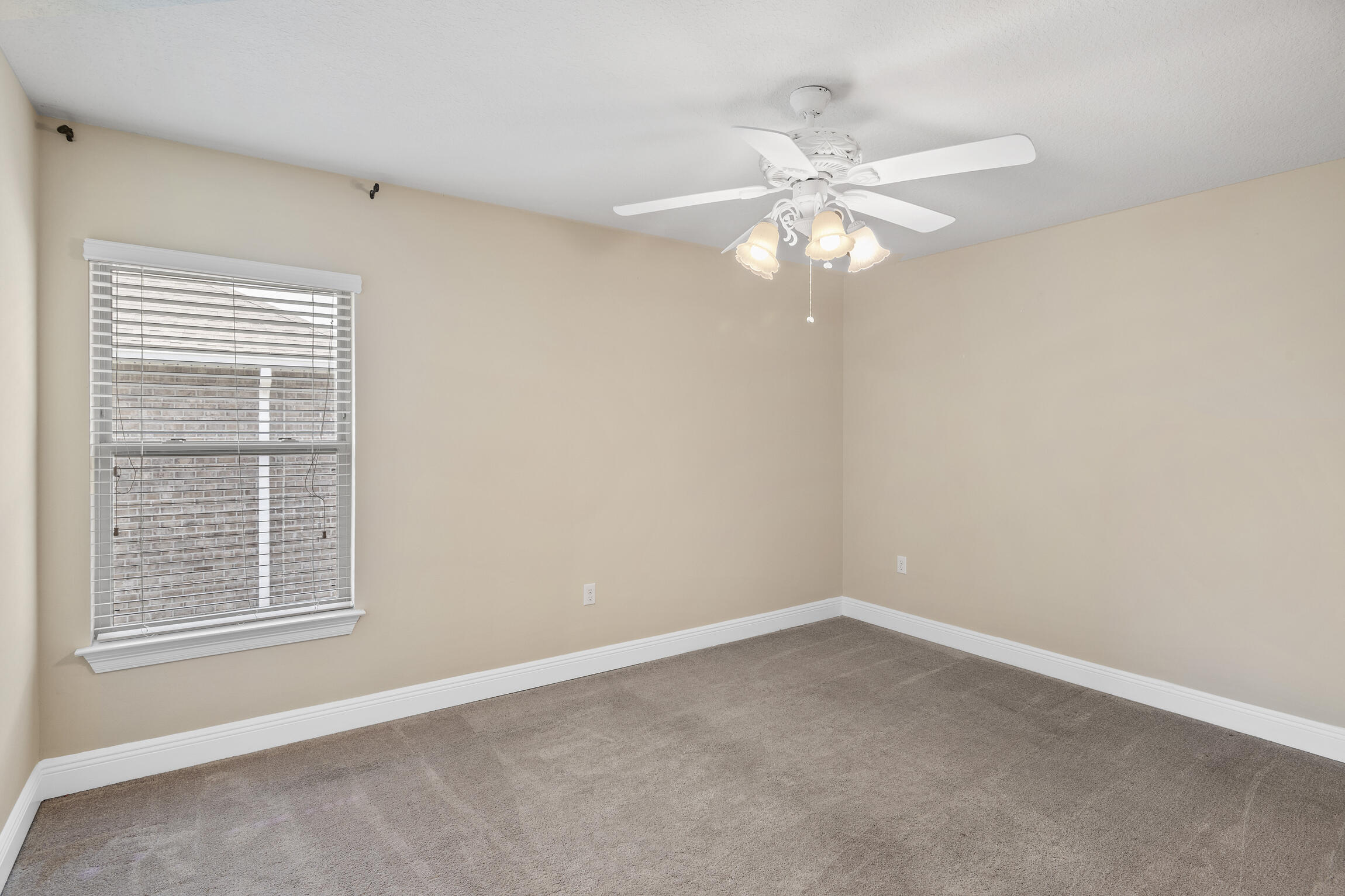 159 Lullaby Loop Santa Rosa Beach, FL 32459 - Photo 17 of 42 an empty room with windows and fan