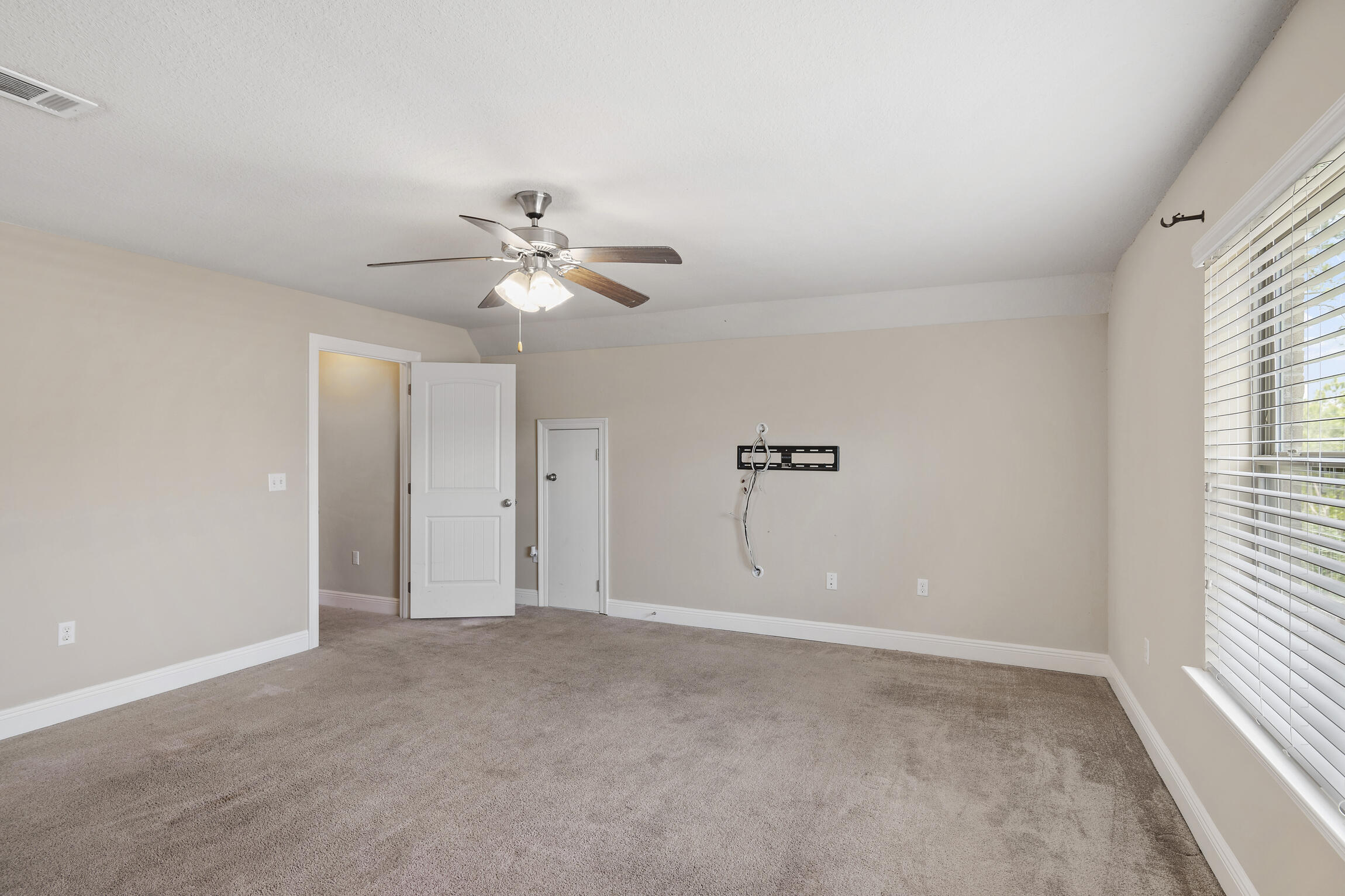 159 Lullaby Loop Santa Rosa Beach, FL 32459 - Photo 24 of 42 a view of a livingroom with a ceiling fan and window