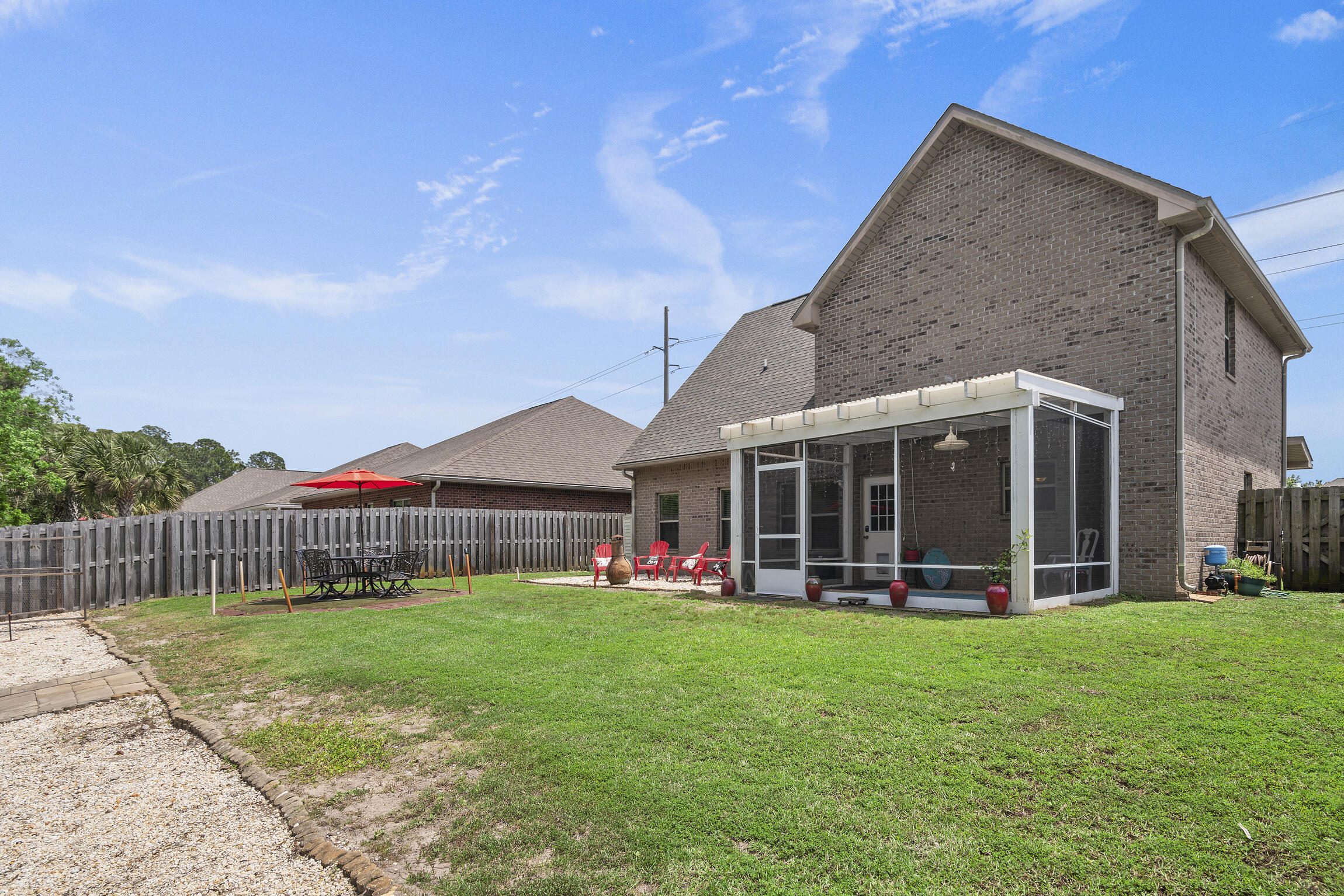 159 Lullaby Loop Santa Rosa Beach, FL 32459 - Photo 27 of 42 a view of a house with a yard and sitting area
