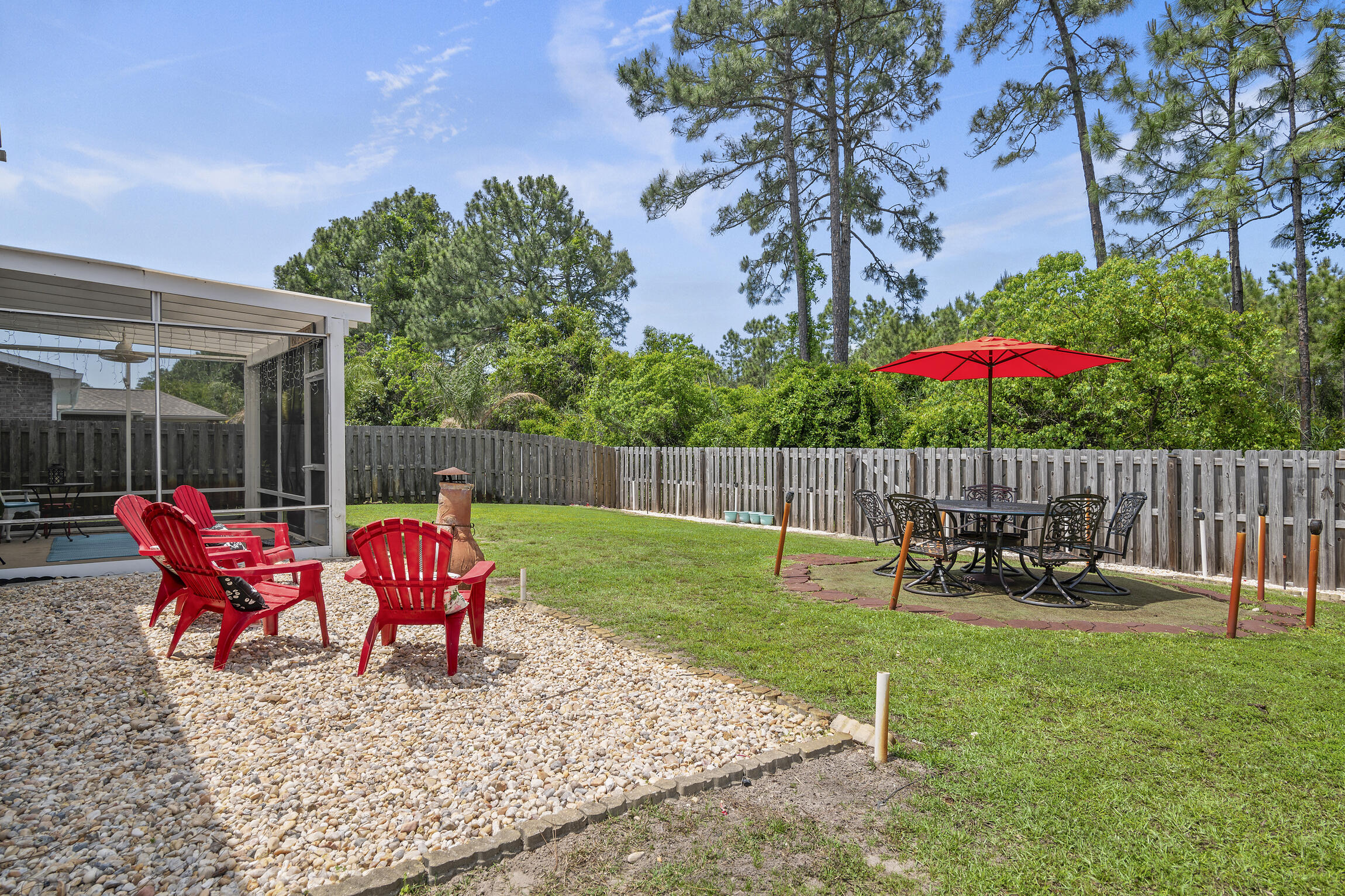 159 Lullaby Loop Santa Rosa Beach, FL 32459 - Photo 31 of 42 a view of a backyard with sitting area