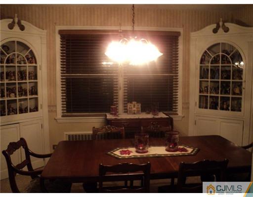 120 Main Street Edison, NJ 08837 - Photo 11 of 14 a front view of a house with sitting area