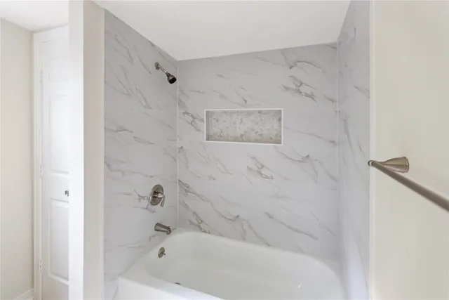 a bathroom with a bathtub