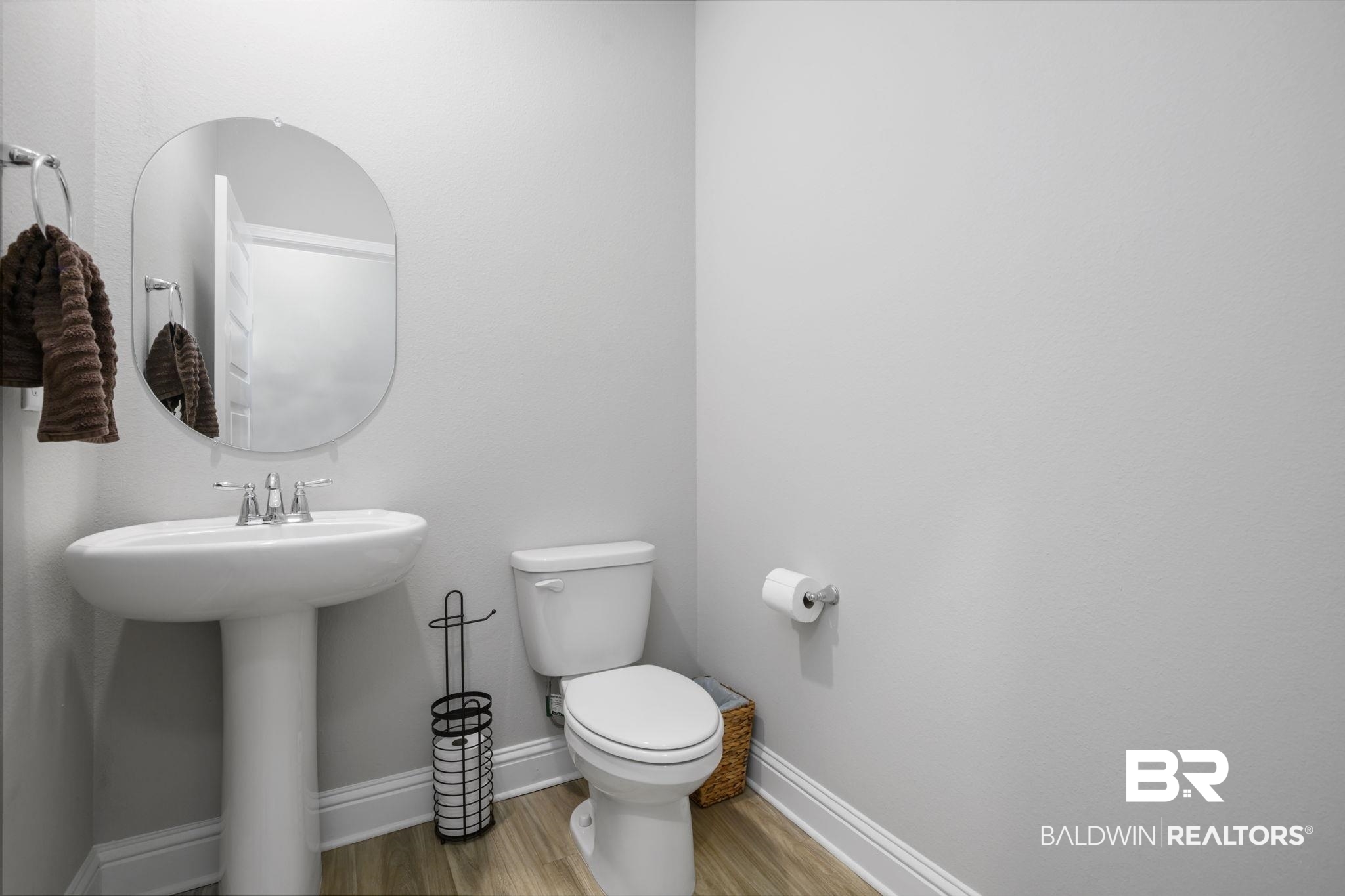 2183 Meadowview Loop Semmes, AL 36575 - Photo 22 of 58 Half bath featuring toilet and light wood-type flooring