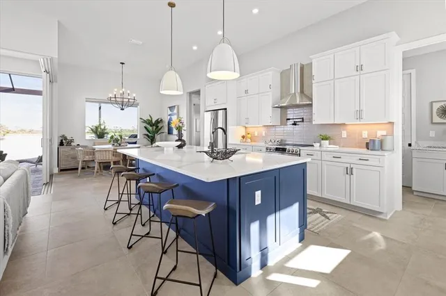 a bathroom with double vanity sink and a mirror